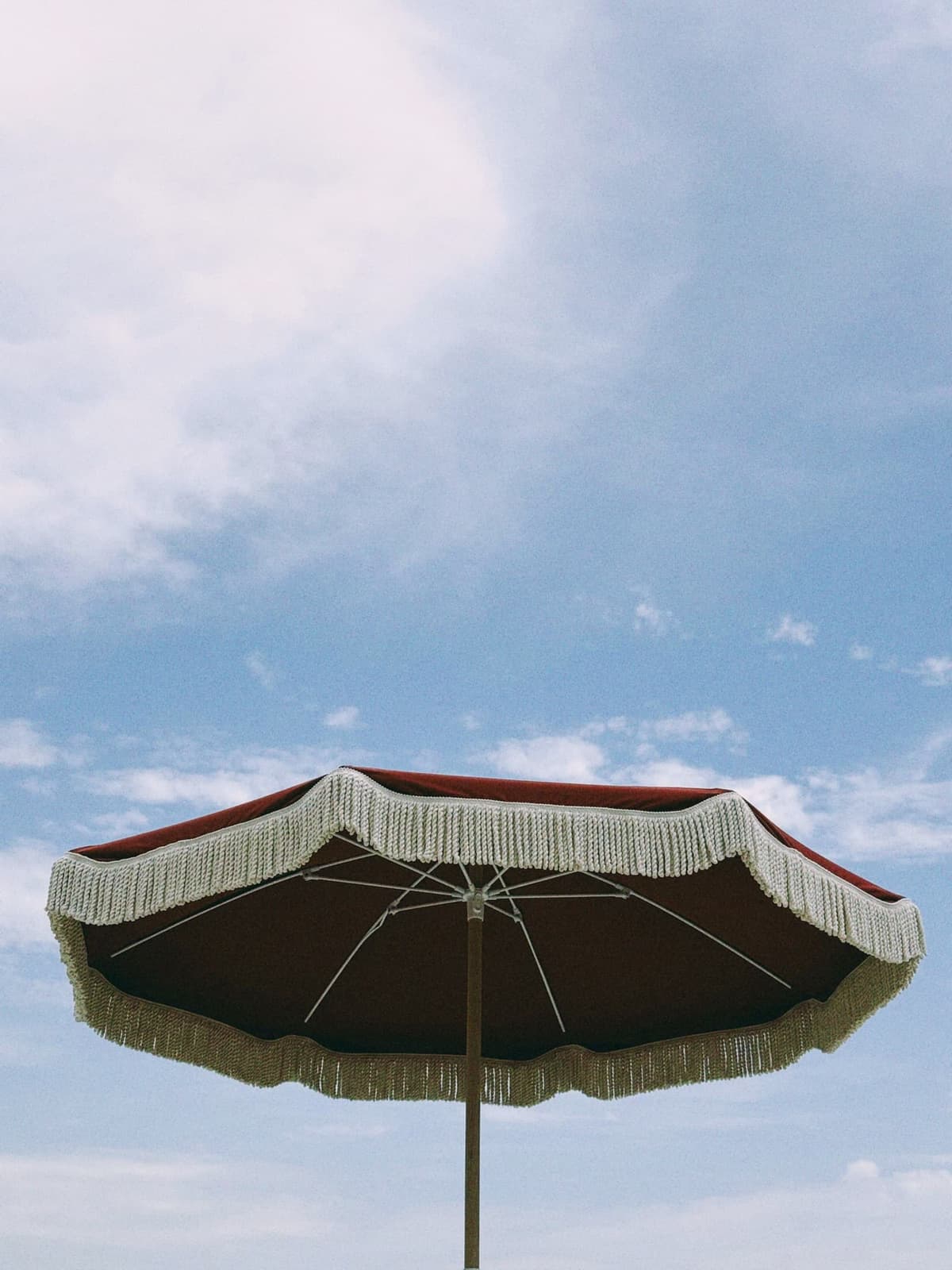 A fringed parasol and nothing else on the agenda