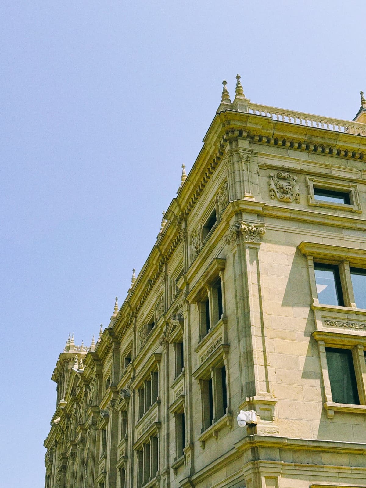 A carved stone corner holding up the whole blue sky