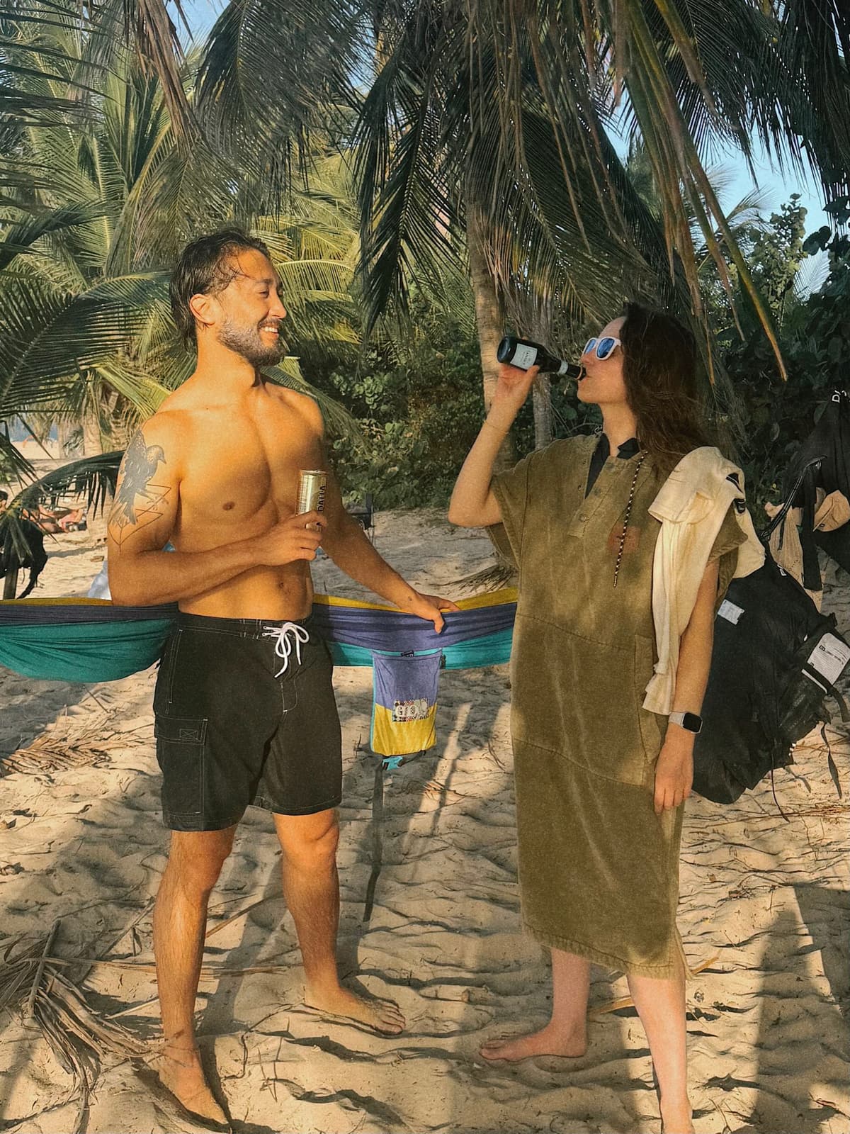 Drinks by the hammock under the palms, sand underfoot